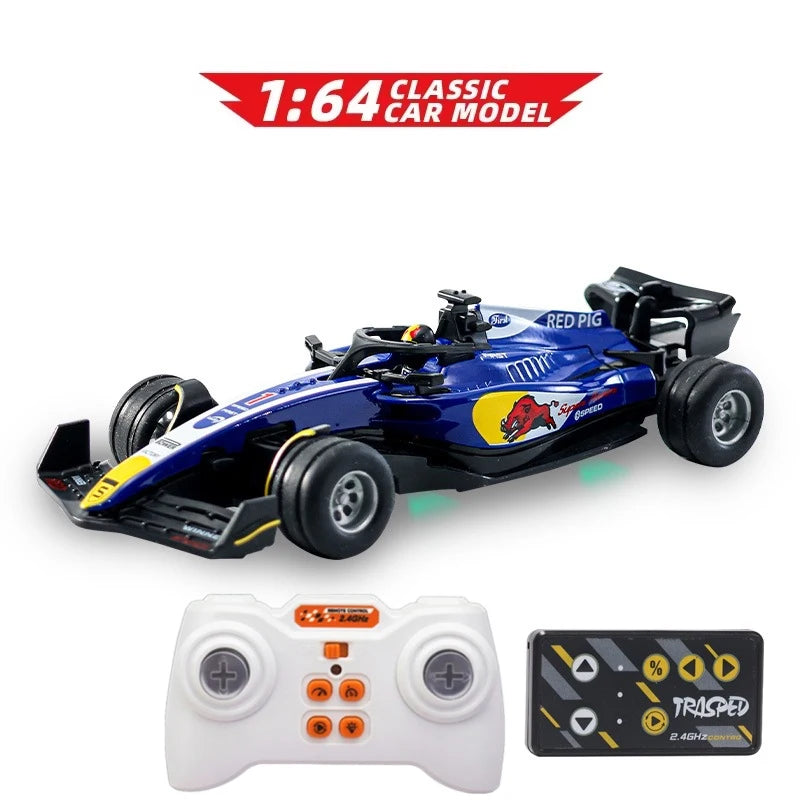 A blue 1:64 scale RC drift car model with wheels and a controller for operation.