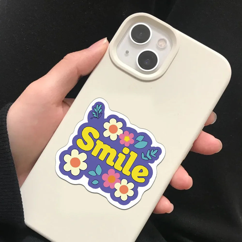 A light beige phone case featuring a purple and yellow floral design with the word Smile.