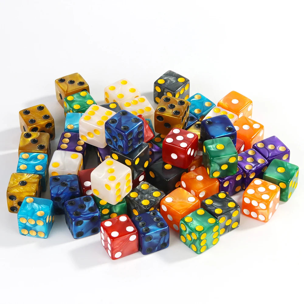 A collection of ten marble acrylic dice in various colors and patterns scattered on a white surface.