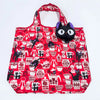 A red fabric tote bag featuring a pattern of black cats and various red decorative elements.