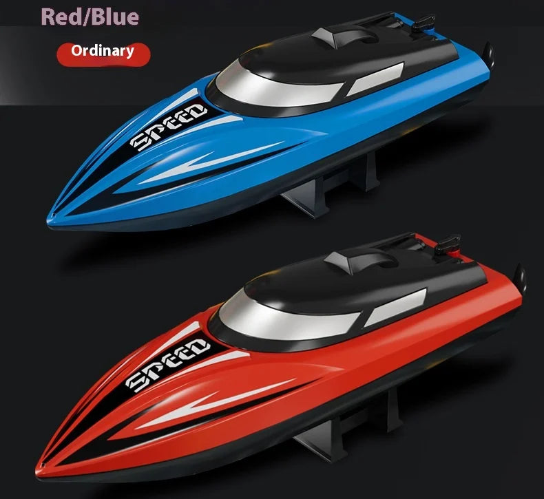 A side view of a red and blue high-speed RC boat model with a sleek design.