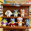 A collection of various blue and orange plush toys, including a dog-like figure, displayed on wooden shelves.