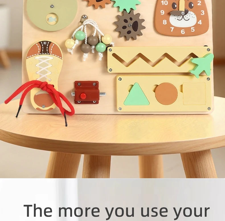 A wooden busy board for Montessori activities featuring various shapes and musical elements like a guitar and airplane.