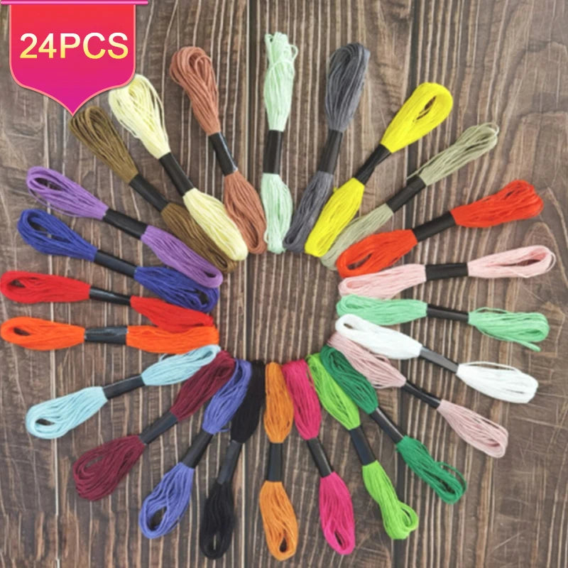 A collection of 24 packs of vibrant organic cotton embroidery floss in various colors and shades for cross stitch and crafts