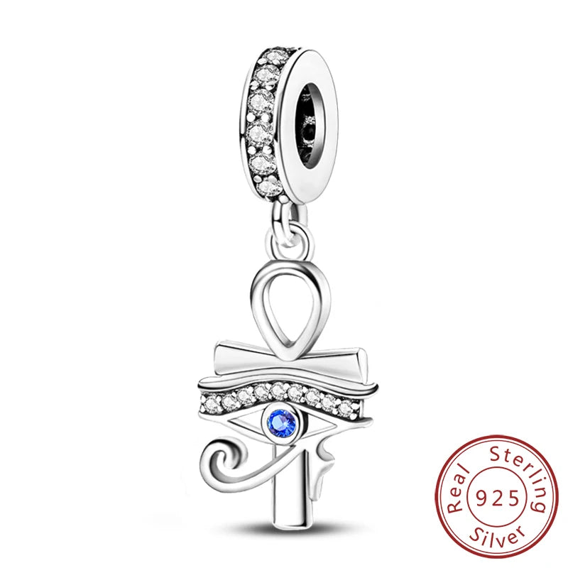 Sterling silver charm beads set featuring cross, angel, and evil eye designs for DIY jewelry making