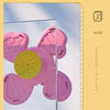 Pink suction cup spinner bath toys are shown against a light background with a glass surface.