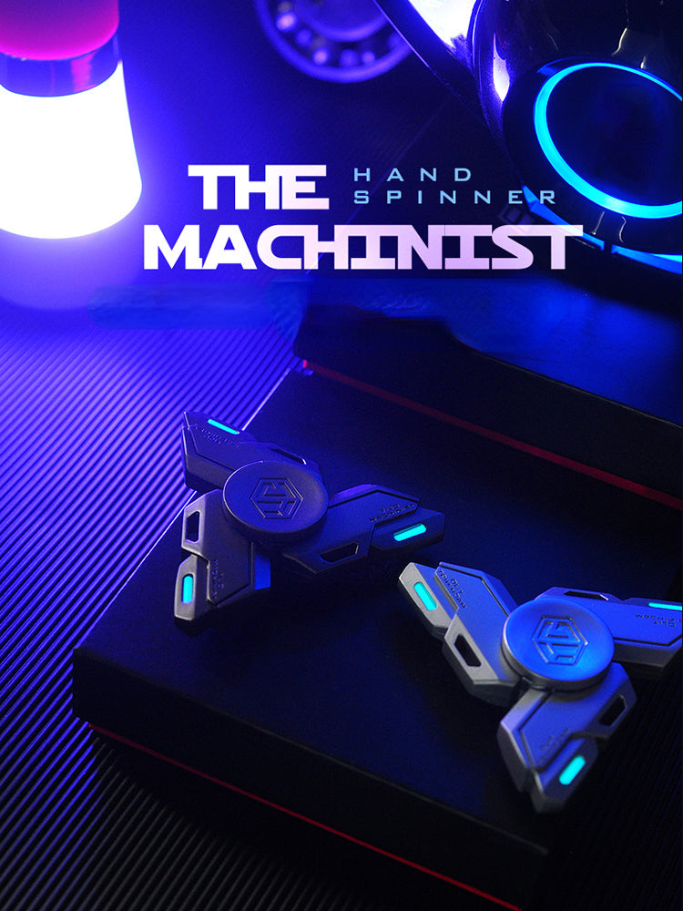 A black metal luminous fidget spinner is displayed on a dark surface with a purple light background.