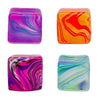 A collection of four colorful, marbled cube toys in shades of purple, orange, pink, and green.