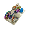 A miniature Stirling engine model featuring a light bulb and colorful metal components.