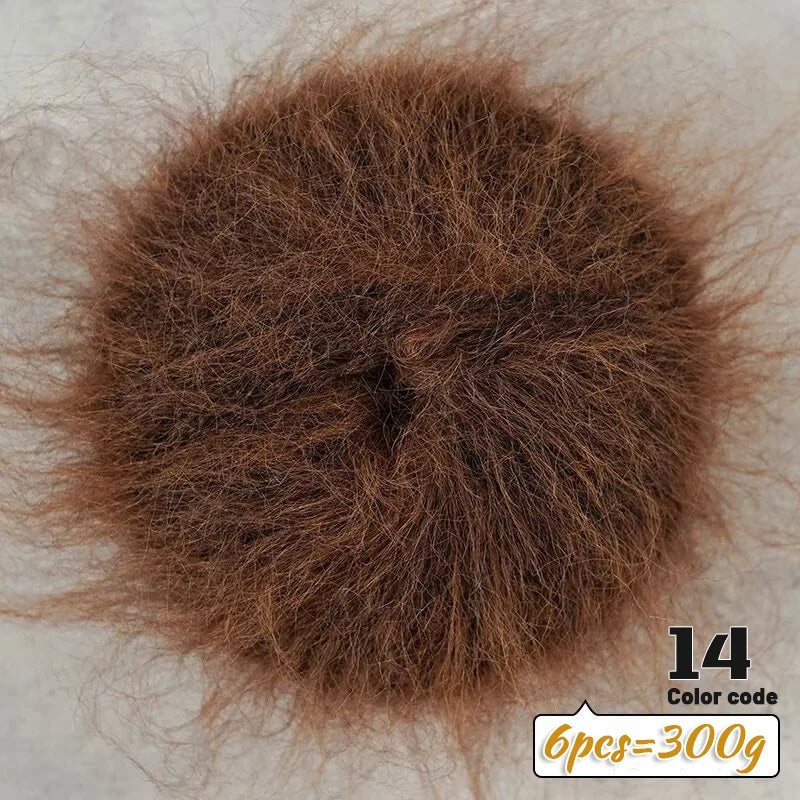 A close-up of dark brown long-haired alpaca blend yarn used for knitting, showing the fiber texture.