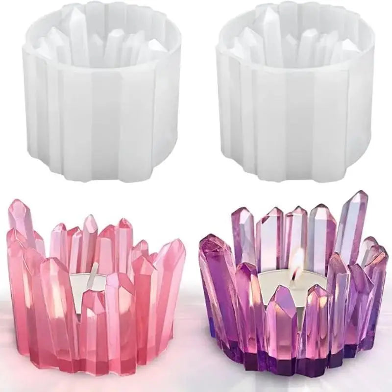A set of clear silicone candle molds shaped like crystals in pink and purple colors.
