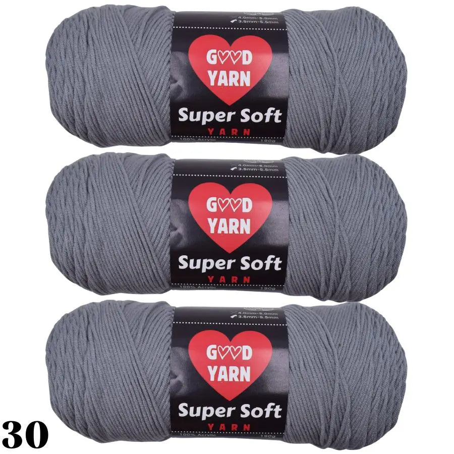 Three skeins of gray Super Soft yarn labeled GVD YARN are shown rolled up.