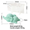 A white silicone mold shaped like an elephant, shown next to a finished light green candle.
