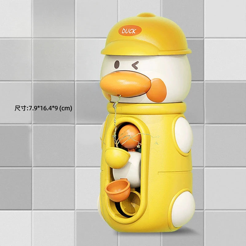 A yellow duck bath toy with a suction cup, featuring an elephant-like body and waterwheel.