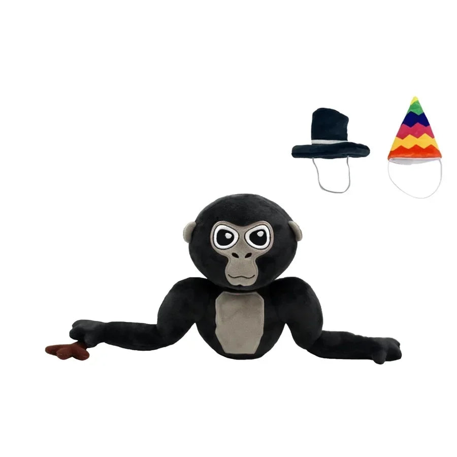 A black gorilla plush toy with large eyes is shown next to a colorful triangle accessory.
