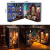A wooden book nook kit featuring detailed miniature scenes with LED lights and architectural elements.