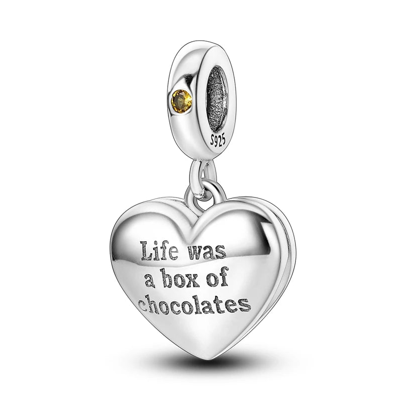 A sterling silver heart-shaped charm bead with a yellow gemstone, designed for DIY bracelet making.