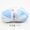 A ball of light blue and white yarn labeled as Jim Jane cotton yarn for knitting and crochet