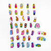 A collection of colorful, plastic racing figures and components for a board game.