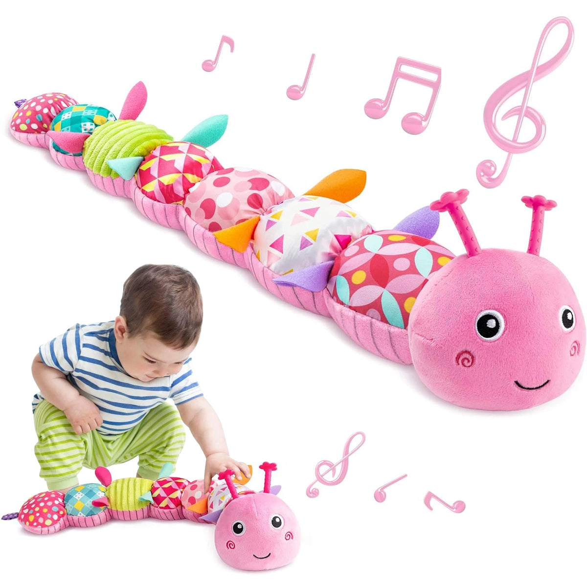 A colorful plush caterpillar toy with musical notes and a rattle, being played with by a baby.