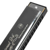 A black 24-hole C tone tremolo harmonica with a silver-edged hard case.