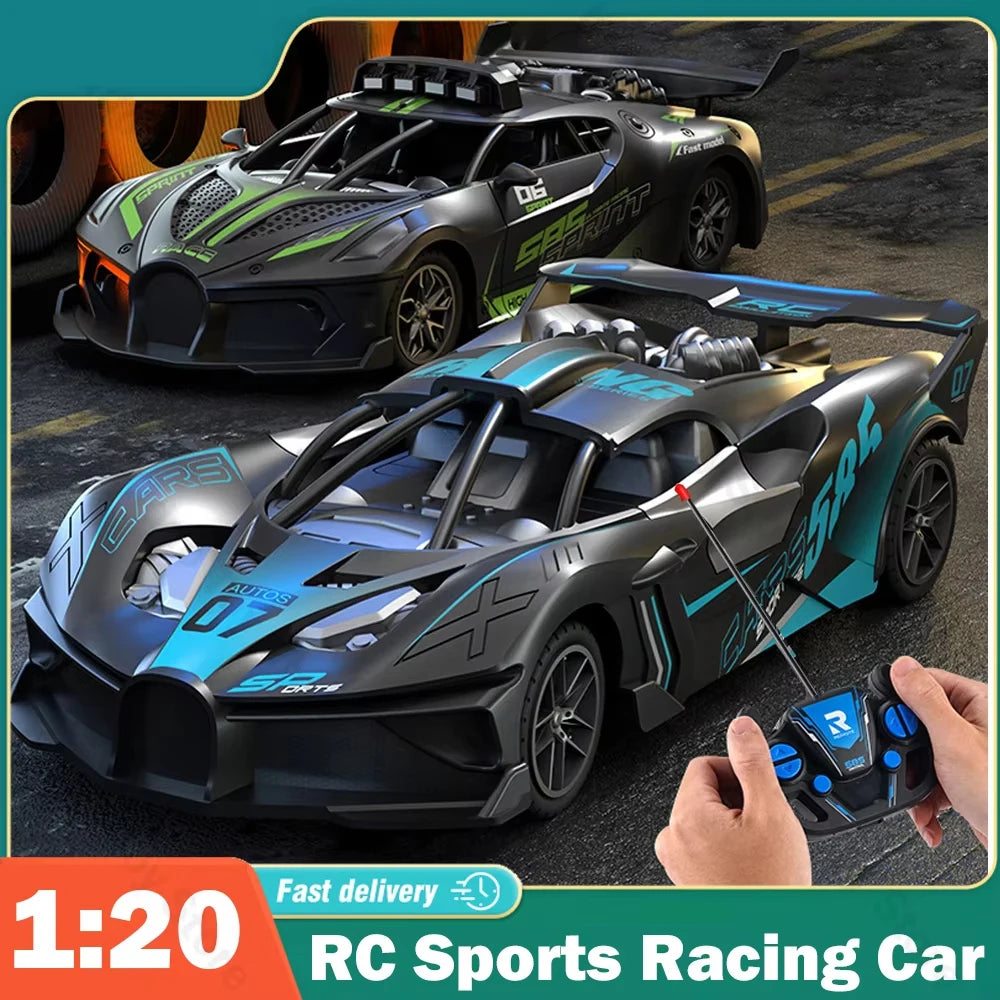 A black and green RC sports racing car is shown in a close-up, being held by a hand.