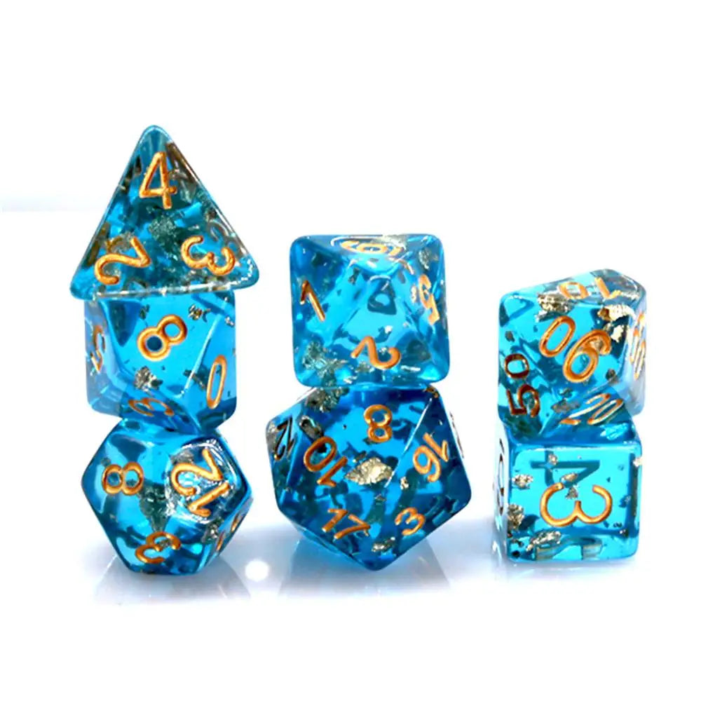 A set of six ocean blue gold foil resin dice showing numbers 1 through 6