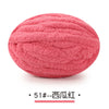 A ball of pink chunky chenille yarn labeled 51--pink.