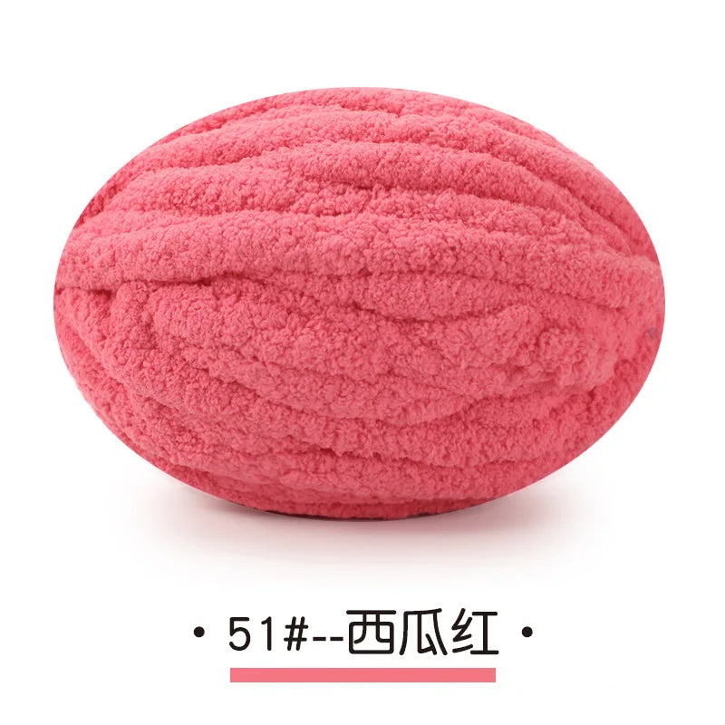 A ball of pink chunky chenille yarn labeled 51--pink.