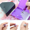 Close-up of various stainless steel screw-on vacuum diamond painting pen replacement tips and a purple painting kit.
