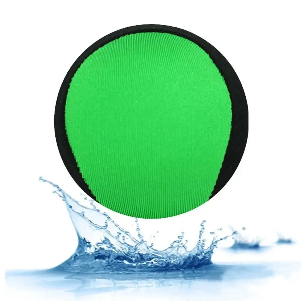A bright green water bouncing ball splashing in clear water.