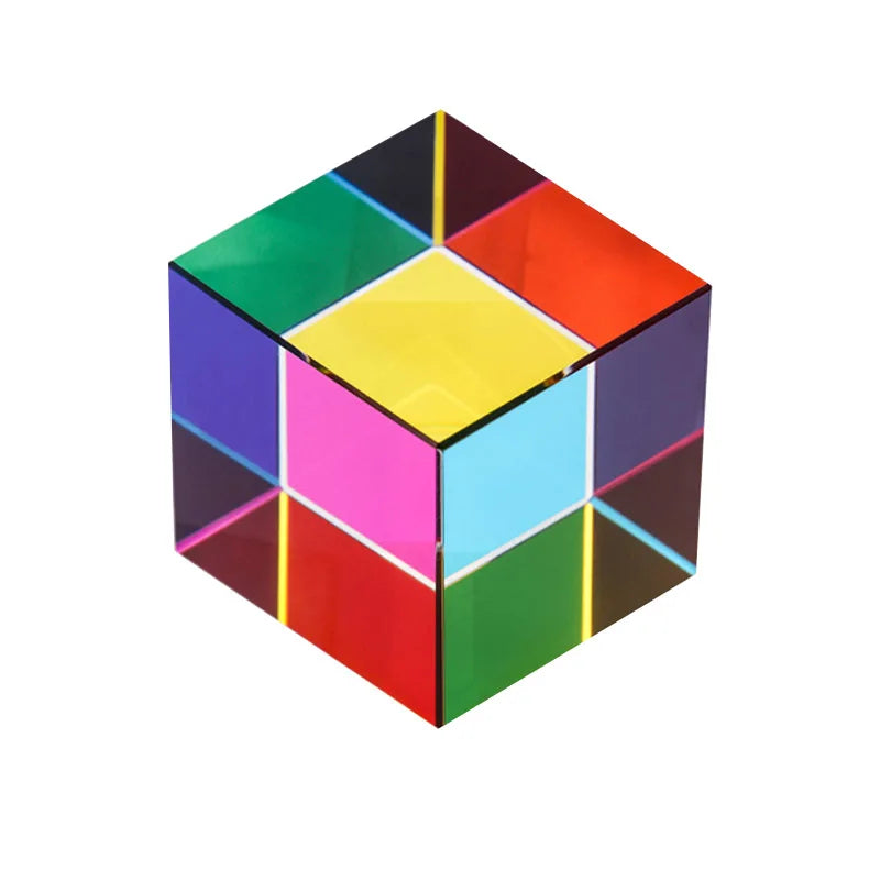 A colorful cube prism with six faces displaying various bright colors like green, blue, red, yellow, pink, and purple.