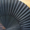 Elegant black folding hand fan with bamboo frame shown in a fan shape.