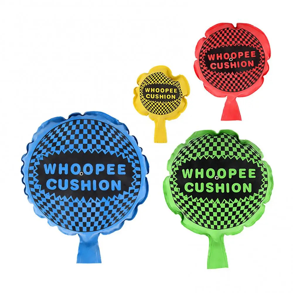 Three colorful whoopee cushions in red, yellow, and green for pranks and gags