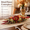 A DIY building block rose bouquet featuring various dried flowers and greenery arranged for a centerpiece.