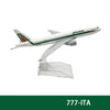 A white and green Alitalia aircraft model in a display stand.
