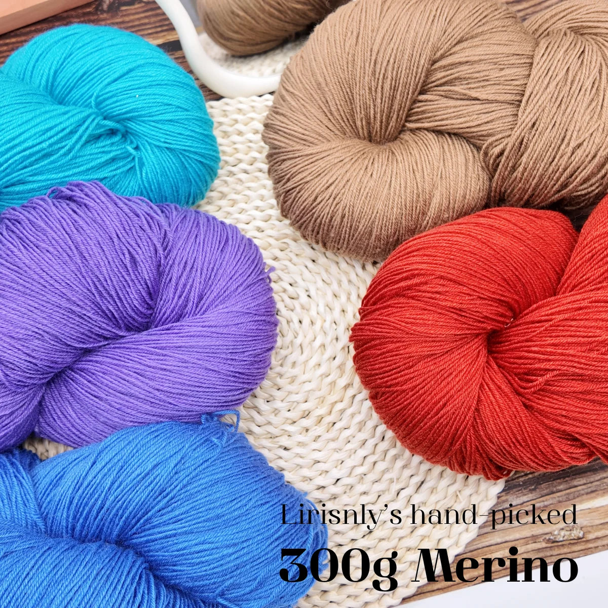 A collection of hand-plied merino wool yarn in various colors including blue, purple, orange, and beige.