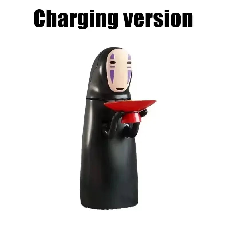 A black house-shaped piggy bank with a face and a red mouth is shown.