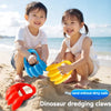 Two children are playing with colorful dinosaur dredging claws in the sand.