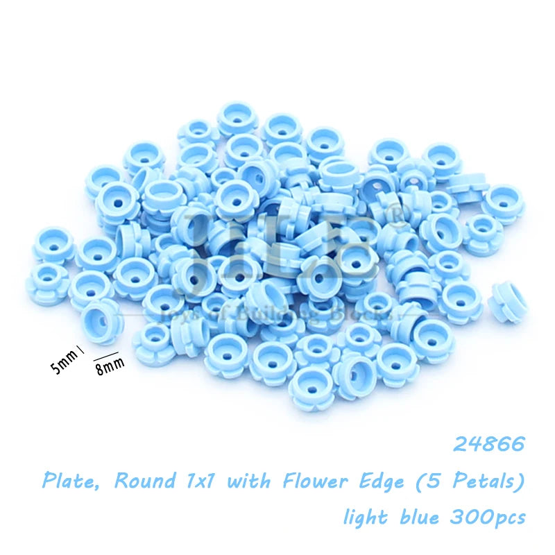 A pile of light blue round plates with a flower edge for building blocks