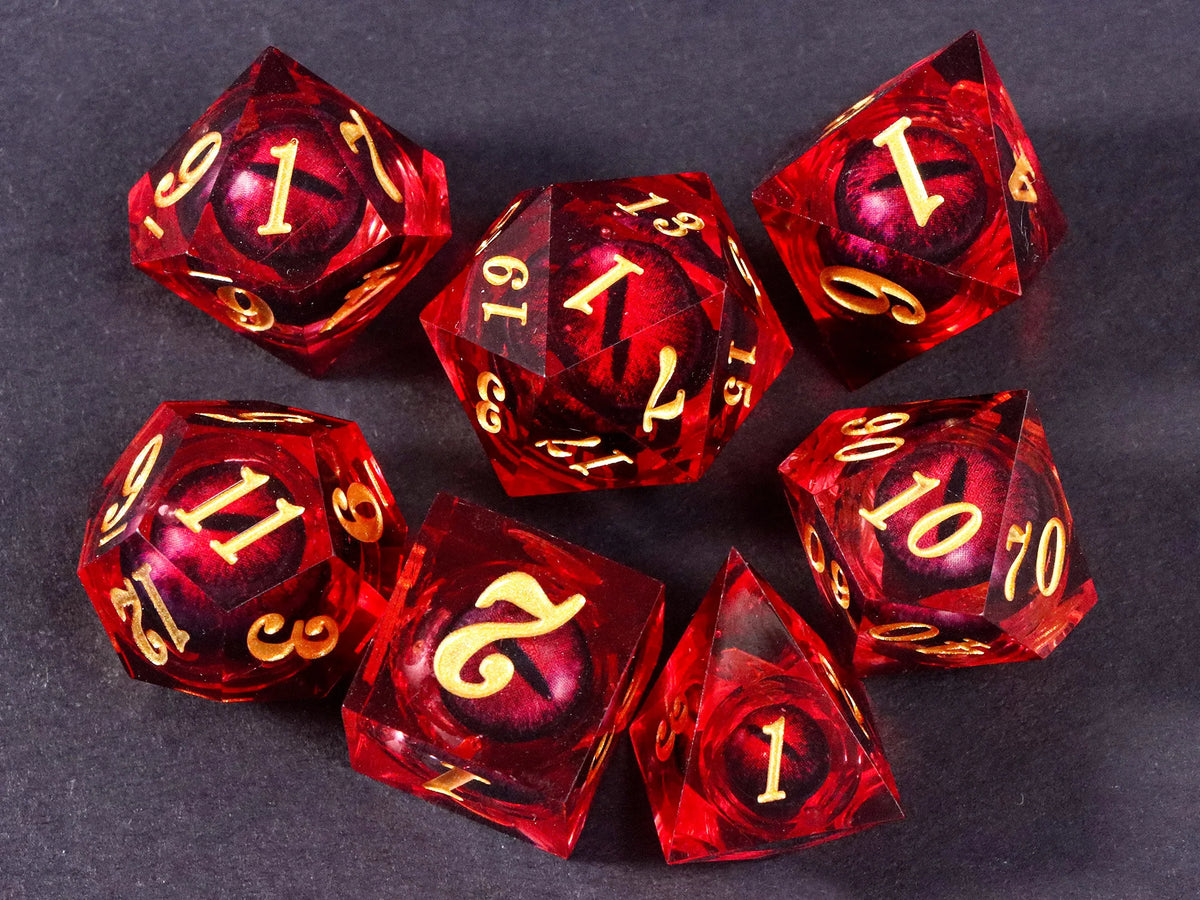 A set of seven red resin polyhedral dice, including a d10 and d12, resting on a dark surface.