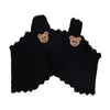 Black fabric wings with two small bear-like appliqués on the back