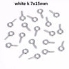 A collection of white K-shaped eye pins with screw threads for jewelry making.