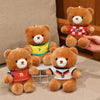 Three teddy bears wearing football jerseys in red and yellow colors