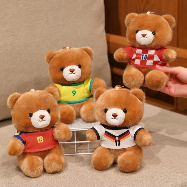 Three teddy bears wearing football jerseys in red and yellow colors