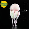 Pink jellyfish plush toy with translucent dome and fluffy tentacles