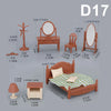 A set of 1:12 scale dollhouse furniture including a bed, mirror, dresser, and other accessories in a reddish-brown color.