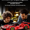 A red MOC hypercar building blocks set is shown on a wooden table, with two people working on it.