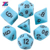 A collection of light blue polyhedral dice including d20, d8, d10, d6, and d12.
