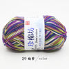 A skein of multi-colored yarn labeled as Jin Jane cotton yarn for knitting and crochet